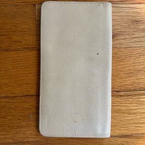 Fossil leather check carrier